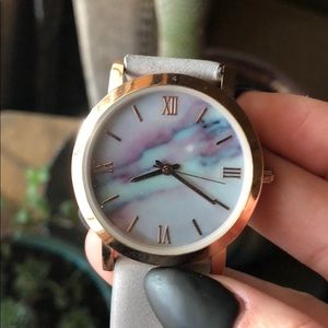 Gray and marble watch.